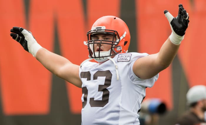 Former Browns offensive guard Austin Corbett stretches during the team's 2018 training camp in Berea. After reaching to draft Corbett that year, the Browns released him three games into the 2019 season.